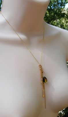 "I designed this necklace for Stassi based on the color and shape of the stone. Stassi loves the green and yellow colors in the quartz teardrop stone (12mm X 14mm). She wanted me to create a necklace based off her \"Boho\" style. This necklace can be made in sterling silver or 14k gold fill flat cable chain. The chains fall like a \"messy\" tassel, all different lengths. There are several citrine stones and 22k gold plated nuggets that are at the bottom of some of the chains. There are several s Gold Teardrop Drop Necklace With Natural Stones, Green Teardrop Gemstone Drop Necklace, Green Drop-shape Birthstone Necklace, Green Teardrop Jewelry With Adjustable Chain, Green Teardrop Necklace With Adjustable Chain, Citrine Stone, Yellow And Green, Green And Yellow, 22k Gold