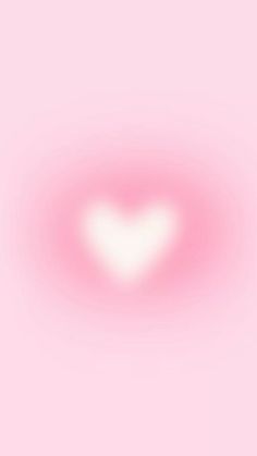 a heart shaped object on a pink background