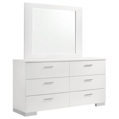 a white dresser with a mirror on top and drawers below it, in front of a white background