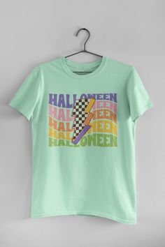 🖤 Product Details:- 100% Soft Ring-Spun Cotton- Light fabric that runs true to size- Unisex- Made in the USA 🇺🇸 🖤 Description:Step into the Halloween season with our Halloween Retro Groovy T-Shirt, an absolute must-have for all you cool cats and spooky enthusiasts out there! Embrace the vintage vibes of the 70s with this rad tee that features vibrant and psychedelic Halloween-themed graphics. Perfect for those who love all things groovy, funky, and Halloween. Whether you're hitting a costume Casual Green Halloween Top, Halloween Graphic Design Short Sleeve T-shirt, Halloween Graphic T-shirt For Fan Merchandise, Halloween Fan Merchandise T-shirt With Graphic Design, Halloween Graphic Crew Neck T-shirt, Halloween Graphic Design T-shirt For Fan Merchandise, Casual Halloween Graphic T-shirt, Green Halloween T-shirt For Streetwear, Fun Fall Fan Merchandise T-shirt