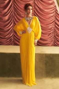 Yellow draped dress with mirror, bead, cutdana embroidery in geometric pattern. - Aza Fashions Georgette Dress Western, Dress Georgette, Embroidery Mirror, Vacuum Storage, Ready To Wear Saree, Indian Wedding Wear, Georgette Dress, Sleeves Blouse, Full Length Dress