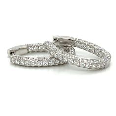 These oval diamond hoop earrings have been given a stylish touch with an elegant round cut diamonds placed inside and out. 18K white gold hoop earrings are set with 3.98carats 3 rows round diamonds. Every woman can always use a pair of classic diamond hoop earrings to add to their wardrobe. Accessorize with these hoop earrings for fun and casual looks, or formal occasions where you want the focus to be on your outfit.Metal: 18K White GoldDiamond Weight: 3.98ct t.w.Diamond Shape: 138 Round brilli Oval Brilliant Cut Hoop Earrings For Wedding, Oval Hoop Earrings With Brilliant Cut For Wedding, Wedding Hoop Earrings With Brilliant Cut, Wedding Oval Hoop Earrings With Brilliant Cut, Luxury Oval Diamond White Hoop Earrings, Oval Brilliant Cut Hoop Earrings For Formal Events, Formal Oval Hoop Earrings With Prong Setting, Oval Hoop Earrings With Brilliant Cut For Formal Occasions, Elegant Oval Hoop Earrings With Halo Design