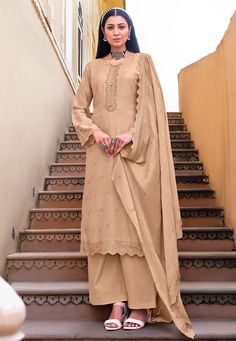 Beige viscose kameez with palazzo 3169  Desc:  Style : Pakistani Salwar Kameez Color : Beige Fabric : Viscose   Muslin Work : Embroidery Wash Care : Dry clean Sleeve Style : Full Sleeve Long Sleeves : Done only in Custom Stitch Sleeves Lining : Done only in Custom Stitch Bust Size : 32 to 42 Inches Occasion : Temple Wear   Social Gathering   Pongal   Lohri   Gudi Padwa   Onam. With Express Free Shipping and Custom Stitching, Buy Indian Party wedding wear salwar Beige viscose kameez with palazzo Pakistani Salwar Kameez, Cotton Bottoms, Embroidery Suits, Salwar Suit, Indian Ethnic Wear, Indian Designer Wear, Viscose Fabric, Designer Wear, Salwar Suits