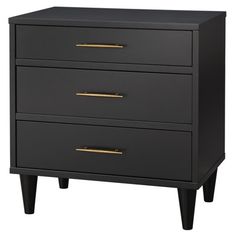 a black and gold dresser with three drawers on it's legs, one drawer open