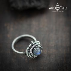 Unique bohemian style wire wrapped Silver filled Ring with natural labradorite gemstone The ring wrapped with silver filled copper wire that has a 10% plating of silver. It was oxidized to create antique look and to highlight the details of the wire work. Ring size US: 6 If you want different size, please don't hesitate to contact me, I will make a similar ring with the size you want :) ----- How to measure size of your ring size: https://www.wikihow.com/Find-Your-Ring-Size Properties of Labrado Handmade Minimalist Moonstone Crystal Ring, Minimalist Handmade Moonstone Crystal Ring, Hand Forged Moonstone Jewelry For Promise Ring, Handmade Adjustable Unique Moonstone Ring, Handmade Adjustable Moonstone Ring, Unique Handmade Adjustable Moonstone Ring, Handmade Adjustable Moonstone Crystal Ring, Handmade Adjustable Spiritual Moonstone Ring, Dainty Hand-wrapped Ring Jewelry