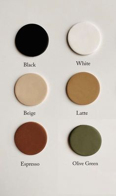 the different shades of eyeshades are shown on a white surface with black, white, and olive green