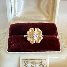 Beautiful vintage 14K yellow gold round diamond Clover/Shamrock Good Luck statement Ring  Size 7, can easily be resized by your local jeweler  Weight 3.1 Grams  Stamped & Hallmarked  "14K" & "AJ" Maker's Mark for Joseph Aion Manufacturing Jewelers  Philadelphia, PA  Era 1950-1978 Genuine earth mined round single cut diamond measures 2.5mm, in diameter & secure in a 4 prong setting  Estimated Color I-J Clarity SI-2 Ring Face measures 14mm N/S x 17mm across E/W Shank measures 1.5mm wide at shoulde Heirloom 14k Gold Flower Ring With Rose Cut Diamonds, Collectible 14k Gold Diamond Ring With Rose Cut Diamonds, 14k Gold Flower Ring With Round Cut, Heirloom 14k Gold Flower Ring, Victorian 14k Gold Jewelry With Single Diamond, Heirloom Style 14k Gold Flower Ring, Vintage Diamond Flower Ring As Gift, Heirloom Diamond Flower Ring In Yellow Gold, Classic 14k Gold Flower Ring With Rose Cut Diamonds