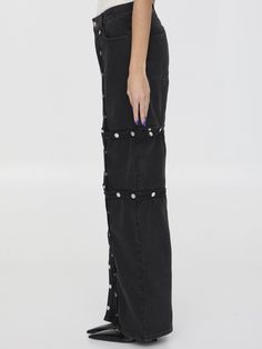 Black cotton denim pants with all-over logoed snap buttons. It features zip and button closure, five-pocket design, belt loops and The Attico logo embroidered at the back. Regular fit. The model is 180cm tall and wears size 26.  Size nationality: US  Product number: 38192733  Product code: WCP144D068100  Composition: 100% cotton Straight Leg Bottoms With Button Zip Fly For Streetwear, Black Denim Pants With Button Closure, High Waist Button Closure Streetwear Bottoms, Streetwear Cotton Jeans With Buttons, Cotton Jeans With Buttons For Streetwear, Denim Bottoms With Buttons For Streetwear, Mid-rise Cotton Bottoms With Snap Buttons, Straight Leg Cotton Jeans With Snap Buttons, Cotton Straight Leg Jeans With Snap Buttons