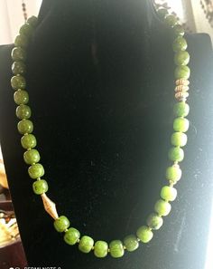 A good quality nephrite jade necklace of 10 mm 46 cm festive golden supply for women Vintage: before 2004 materials: natural apple green jade gem, gold metal Necklace length 46 cm clasp: magnetic gold metal  jade beads size:10mm in diameter In very good condition Necklace in a magnificent green color, original, good gift for women Gift wrapping is free Spiritual Gold Jade Beaded Necklaces, Spiritual Gold Jade Beaded Necklace, Gold Jade Beaded Necklaces With Gemstone Beads, Gold Jade Beaded Necklaces With Gemstones, Gold Jade Gemstone Beaded Necklaces, Gold Jade Necklace With Gemstone Beads, Gold Jade Necklaces With Polished Beads, Gold Jade Necklaces With Round Beads, Jade Bead Necklace