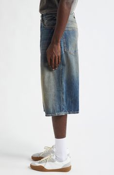 A weathered-and-veined finish brings a sense of instant history to these nonstretch-denim shorts crafted in a knee-length, baggy cut with a leather logo patch at the back. Zip fly with button closure Five-pocket style 100% cotton Machine wash, line dry Made in Italy Designer Clothing Rugged Washed Bottoms With Relaxed Fit, Rugged Relaxed Fit Washed Bottoms, Rugged Washed Rigid Denim Bottoms, Straight Leg Distressed Shorts For Streetwear, Rugged Relaxed Fit Medium Wash Bottoms, Faded Rugged Bottoms With Relaxed Fit, Rugged Relaxed Fit Faded Bottoms, Rugged Medium Wash Bottoms, Rugged Faded Rigid Denim Bottoms