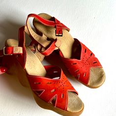 Super Cute Never Worn Deadstock Wedge Rubber And Leather Sandals. No Dry Rot Or Dry Glue In Perfect Shape And Comfy. Red Wedge Sandals With Removable Insole And Round Toe, Red Wedge Sandals With Platform And Round Toe, Red Platform Wedge Sandals With Round Toe, Red Leather Wedge Sandals, Beach Wedge Heel Clogs With Heel Loop, Vintage Wedge Sandals For Beach, Red Casual Wedge Sandals With Round Toe, Red Closed Toe Wedge Sandals For Summer, Red Closed Toe Wedge Sandals For Spring