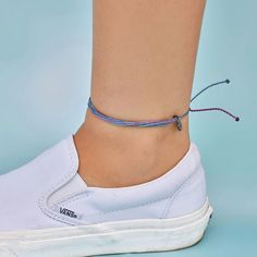 Slightly larger than our original bracelets, your ankle can now be as stylish as your wrist! Every anklet is 100% waterproof. Go surf, snowboard, or even take a shower with them on. Wearing your anklets every day only enhances the natural look and feel. Every anklet is unique and hand-made therefore a slight variation in color combination may occur. - 100% waterproof- Wax-coated- Adjustable from approximately 3-6 inches in diameter- Because jewelry products are handcrafted by artisans, dimensions may vary from piece to piece Casual Ankle Wrap Anklet As Gift, Casual Summer Ankle Wrap Bracelets, Casual Adjustable Length Summer Anklets, Casual Summer Anklets With Sliding Knot, Casual Summer Anklets With Adjustable Length, Casual Summer Anklet With Adjustable Length, Casual Adjustable Ankle Wrap Anklets, Casual Adjustable Length Anklets As Gift, Casual Everyday Friendship Bracelets