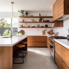 the kitchen is clean and ready for us to use it's natural wood accents