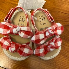 Red Gingham 3-6 Months. Cute Red Sandals With Round Toe, Cute Red Sandals For Summer, Playful Red Open Toe Sandals, Adjustable Non-slip Red Sandals, Cute Red Sandals For The Beach, Casual Gap Sandals For The Beach, Gap Sandals With Round Toe For Spring, Gap Casual Beach Sandals, Cute Red Beach Sandals