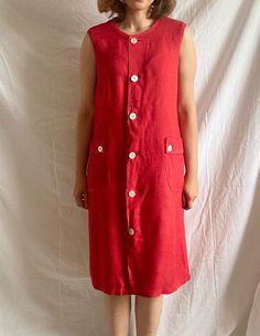 "Vintage red summer dress from Harrods London Composition: No composition label but feels 100% thick linen Condition: Quite good Size: This would fit from size S to L, depending on the desired fit (Garments are put flat while taking measurements.) Measurements: Total dress length: 103 cm (40.5\") Bust circumference: 106 cm (41.5\") Model's size : 38 EU, 173 cm  *Please concentrate on measurements, instead of size tags on the pieces. Vintage sizes don't always reflect modern sizing. *European Buy Red Linen Short Sleeve Dress, Red Linen Dress With Short Sleeves, Casual Red Linen Dress, Vintage Linen Beach Dress, Vintage Knee-length Linen Dress, Vintage Knee-length Linen Summer Dress, Sleeveless Red Linen Dress For Summer, Red Linen Knee-length Dress, Red Summer Dress