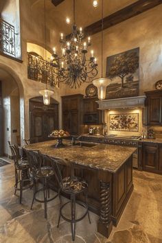 a large kitchen with an island and chandelier