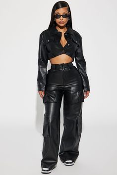 Available In Black. Cargo Pant High Rise Button Zipper Closure Cargo Pockets Wide Leg Faux Leather Non Stretch 100% Polyester Coated With PU Imported | Drop A Pin Faux Leather Cargo Pant in Black size Large by Fashion Nova Fashion Nova Leather Pants, Leather Cargo Pants Outfit Black Women, Flare Cargo Pants Outfit, Black Cargo Pants Aesthetic, Leather Pants Club Outfit, All Black Streetwear Women, Cargo Leather Pants Outfit, Leather Cargo Pants Outfit, Black Cargo Outfit