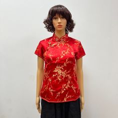 Imported Button closure Hand Wash Only Faux Silk Cheongsam Top Women Chinese Cheongsam Short Sleeve Top Features: The material is soft,comfortable and stretchy. Perfect for casual,wear to work,party,cocktail and wedding. The casual dress is elegant it self. It's simple chic.The dress is really nice and feminine. The casual dress is elegant it self. It's simple chic.The dress is really nice and feminine. Season:Spring ,Summer,Autumn. Note:This is the tile size clothes, the fabrics have elastic, you can stretch 5 cm or 1.96 inch space. Size Chart: Qipao Shirt Chinese Blouse Size S:Bust(81 cm/32.28 inch), Waist(68 cm/26.77 inch), Length(60cm/23.62inch) Size M:Bust(85 cm/33.46 inch), Waist(72 cm/28.35 inch), Length(61cm/24.02 inch) Size L:Bust(92cm/36.61 inch), Waist(78 cm/30.31 inch), Length( Short Sleeve Stretch Blouse With Buttons, Stretch Short Sleeve Blouse With Buttons, Stretch Short Sleeve Blouse With Button Closure, Red Stand Collar Top For Spring, Fitted Stand Collar Top With Buttons, Chinese Blouse, Cheongsam Top, Chinese Cheongsam, Slim Blouse