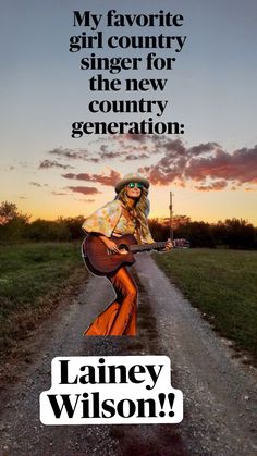 a woman with an acoustic guitar standing on a dirt road in front of a sunset