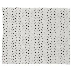 a white and black polka dot print napkin