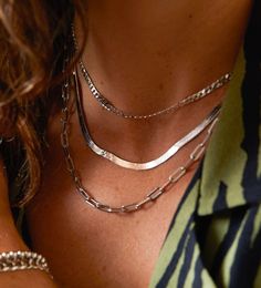 Let this stunning herringbone snake chain necklace slither around your neck as the perfect layer. A unique slinky necklace made to catch the light and shine all night.
Shop the skinny herringbone chain here.
Find the perfect necklace length here. Find our collection of necklace chains here.
Chain width: 5mm

Length: 18" Double Chain Snake Necklace For Layering, Snake Chain Necklace With Double Chain For Layering, Trendy Everyday Delicate Snake Chain Necklace, Everyday Trendy Delicate Snake Chain Necklace, Trendy Herringbone Necklace For Everyday, Trendy Herringbone Necklace With Delicate Chain For Gift, Trendy Snake Chain Clavicle Necklace, Trendy Herringbone Necklace With Snake Chain, Trendy Herringbone Clavicle Necklace With Snake Chain