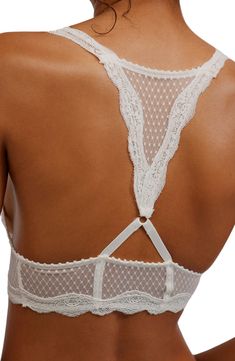 Scalloped lace and dotted mesh add a romantic feel to an unlined racerback bralette that's a perfect complement to styles with cutaway shoulders. Slips on over head Racerback 86% nylon, 14% spandex Hand wash, dry flat Imported Elegant Bra With Lace Bodice, Elegant Underwire Bra With Lace Bodice, Lace Camisole Bra With Lace Trim, Underwire Bra With Lace Bodice, Feminine Lace With Built-in Bra, Feminine Bra With Lace Closure, Lace Bodice Bra For Weddings, Lace Camisole Bra, Fitted Lace With Built-in Bra