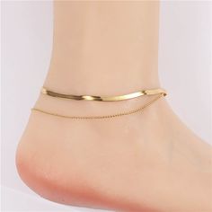 This is a adjustable anklet 20-25cm,; very good quality does not fade; double layer; chic and elegant; Elegant Adjustable Gold Anklets, Trendy Gold Anklet With Adjustable Chain, Adjustable Gold Plated Anklets, Gold Metal Anklet With Adjustable Chain, Trendy Gold Ankle Wrap Anklets, Chic Gold Anklets For Party, Adjustable Gold-plated Anklets, Adjustable Gold Metal Anklets, Gold-plated Adjustable Anklets