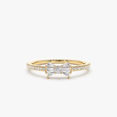 "Diamond Ring / Bow Ring / 14k Gold Baguette and Round Diamond Bow Ring / Dainty Bow Ring / Dainty Ring / Promise Ring by Ferkos Fine Jewelry Ferko's Fine Jewelry * Made to Order * Gold Kt: 14K (also available in 18K) * Available Gold Color: Rose Gold, Yellow Gold, White Gold * Round Diamonds: 22 pcs 1.0 MM * Round Diamonds: 1 pcs 2.0 MM * Baguette Diamonds: 6 pcs 2.5 x 1.4 - 2.5 x 1.3 MM * Diamond Carat Weight: 0.25 ctw * Diamond Color-Clarity: G Color VS/SI Clarity If you have any additional q Diamond Bows, Zierlicher Ring, Gold Armband, Bow Ring, Baguette Diamonds, Wedding Bows, Local Jewelry, Moissanite Wedding Bands, Diamond Carat