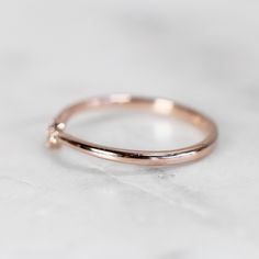 Emmie Contour Point Diamond Wedding Band - Midwinter Co. Alternative Bridal Rings and Modern Fine Jewelry Minimalist Rose Gold Rings With Single Cut Diamonds, Delicate Diamond Ring With Single Cut Diamonds, Minimalist Diamond Stackable Rings With Accents, Minimalist Stackable Diamond Rings With Accents, Minimalist Diamond Stackable Rings With Round Band, Minimalist Stackable Rings With Round Diamond Band, Minimalist 14k Gold Wedding Ring With Diamond Accents, Minimalist Diamond Ring With Single Cut Diamonds For Promise, Minimalist Diamond Half Eternity Stackable Rings