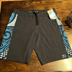 New With Tags Msrp $70 Crafted From Recycled Swim Fabric, The Haikili Boardshort 20" Offers A Comfortable, Regular Fit. Printed Side Panels Feature Original Artwork. Product Type: Boardshorts Fabric: Recycled Polyester Elastane Fit: Regular Fit Other Features: 20in Inseam Black Surfing Athletic Shorts With Built-in Shorts, Black Beachwear Surfing Shorts, Black Beachwear Shorts For Surfing, Black Surfing Shorts For Beach Season, Black Surfing Shorts, Black Casual Athletic Shorts For Surfing, Casual Black Surfing Shorts, Man Swimming, Side Panels