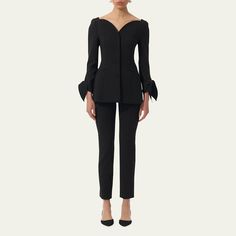 Carolina Herrera tailored jacket features curved detailing at the neckline and self-tie bows at the sleeves  V-neckline  Button-front closure  Long sleeves Front welt pockets  Mid-length  Tailored silhouette  Virgin wool/elastane Made in USA Elegant Fitted Pantsuit With Button Cuffs, Elegant Long Sleeve Outerwear With Bow, Long Sleeve Pantsuit With Structured Boning For Office, Long Sleeve Structured Pantsuit For Office, Tailored Jacket, Carolina Herrera, Bergdorf Goodman, Welt Pockets, Welt Pocket