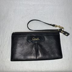 Coach Black Leather Wristlet Wallet Snake Trim. Please view all of the pictures for the condition of the item. The pictures are part of description. Item is sold as it is shown in photos. Please take note this is a used item. There might be some discoloration or wear abs tear as a used item. Coach Leather Wristlet With Zipper Closure, Coach Formal Pouch Wallet, Coach Leather Clutch With Card Slots, Coach Travel Wallet With Wrist Strap, Take Note, Wristlet Wallet, Leather Wristlet, Rebecca Minkoff Mac, Black Leather