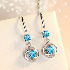 Overview:100% new design and high qualityMust-have for fashion womenHave a beautiful appearance Material: Alloy Type: EarringsModeling: GeometricApplicable gift-giving occasions: employee benefits, weddings, travel commemorations, other Elegant Light Blue Crystal Earrings For Gift, Blue Elegant Design Earrings For Anniversary, Silver Hoop Earrings With Elegant Design, Silver Hoop Earrings With Elegant Design As Gift, Elegant Light Blue Hypoallergenic Earrings, Elegant Blue Crystal Earrings For Gift, Light Blue Jewelry For Wedding, Elegant Light Blue Jewelry For Gift, Elegant Blue Round Earrings