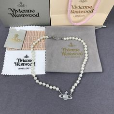 Brand New Vivienne Westwood Silver Orb Pearl Choker Necklace Button Necklace (Brand New) Brand New, Never Worn, Nwot 100% Authentic Comes With Gift Box, Gift Bag, And Dust Bag,Brand Cards,Instruction Manual,Jewelt Cloth. Full Packing As Inculded. Necklace Packed In Secure Packaging For Transit The Length Was : 16.5'' Welcome To Button Necklace, Pearl Choker Necklace, Necklace Brands, Pearl Choker, Instruction Manual, Box Gift, Bag Brand, Christmas Wishlist, Vivienne Westwood