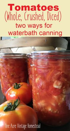 two jars filled with tomatoes sitting on top of a counter next to some other vegetables