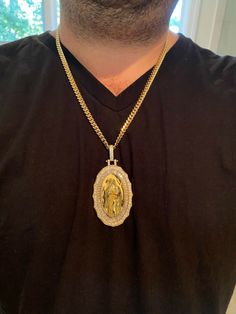 "Simply gorgeous handmade Virgin Mary pendant medallions available in 3 sizes. Solid 925 sterling silver vermeil bonded with 14k yellow gold Doesnt turn green or change color...gold lasts many years as its bonded to real silver underneath! Stamped 925 3 sizes: Small - 1.25\" (1.75\" w bale) 6 grams - Fits up to 5mm chains Medium - 2\" (2.25\" w bale) 16 grams - Fits up to 5mm chains Large - 2.75\" (3.25\" w bale) 31 grams - Fits up to 8mm chains VERY DETAILED. Amazing handmade piece Gorgeous mix Engraved Yellow Gold Cuban Link Jewelry, 14k Gold Medallion With Box Chain, Gold Engraved Cuban Link Jewelry, Hallmarked Cuban Link Jewelry As Gift, Hallmarked Cuban Link Jewelry For Gifts, Gold Plated Cuban Link Jewelry, 14k Gold Cuban Link Jewelry Hallmarked, Virgin Mary Pendant, 10k Gold Chain