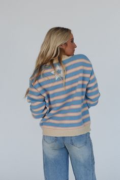 So comfy and cute, the Cosmic Love Star Patch Sweater is the must-have sweater top of the season! Whether dressed up or down, you're going to love it! So cozy fabric with stripes and star details throughout Relaxed and loose pullover top silhouette Flattering round neckline, dropped shoulders, and long sleeves Ribbed with contrast trim along the neckline, cuffs and bottom edges Cutest floral print star patch detailing along the front and one single star patch on center back for added boho style Boho Essentials, Cosmic Love, Patch Sweater, Color Burst, Boho Styl, Bralette Outfit, Cozy Fabric, Loose Pullover, Comfy Pants