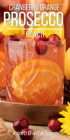 Cranberry orange prosecco punch is a fun Fall or Thanksgiving cocktail. The orange and cranberry flavours make it festive and fruity, while the prosecco gives it a wonderful amount of fizz. Thanksgiving punch is a great festive drink to serve to guests or you could simply make a pitcher to enjoy over the Thanksgiving period. Cranberry orange prosecco punch is perfect as a fall or Thanksgiving cocktail. The holiday punch is a festive drink which looks pretty and tastes delicious. Sparkling Fall Cocktails, New Year’s Eve Pitcher Drinks, Sparkling Thanksgiving Cocktail, Sparkling Cider Punch Non Alcoholic, Foods That Are Orange, Thanksgiving Holiday Drinks Alcohol, Fall Punch With Alcohol, Thanksgiving Champagne Punch