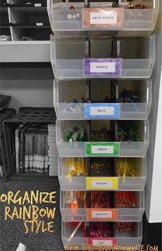 organized storage bins with labels on them