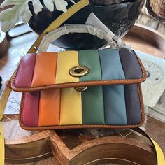 This Is An Adorable Bag. It Is About 8“ X 4.5”X3”. Roomy On The Inside And Can Accommodate An Iphone 14 S Plus With Room For Other Items. Zippered Pouch On The Inside. Shoulder Strap. Turn Lock Closure. Leather. Bag Is Sold Out. I Cannot Find The Dust Bag. Rainbow Purses, Rainbow Bag, Canvas Leather Bag, Coach Crossbody Purse, Maroon Leather, Leather Duffle, Genuine Leather Purse, Bags Coach, Pride Rainbow