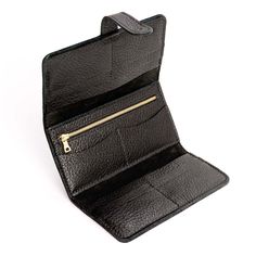 Pebbled--black | Leather wallet with Sam Browne closure open Everyday Trifold Coin Purse With Card Slots, Everyday Trifold Coin Purse With Interior Card Slots, Bifold Coin Purse With Interior Card Slots For Travel, Versatile Trifold Wallet With Coin Pocket For Daily Use, Daily Use Trifold Coin Purse With Card Slots, Travel Bifold Coin Purse With Interior Card Slots, Black Travel Wallet With Coin Pocket, Trifold Wallets With Interior Card Slots For Everyday Use, Black Bifold Clutch With Card Slots