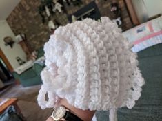 I love making these baby bonnets...  reminds me of the days long ago...    These bonnets never go out of style...and they make such a thoughtful baby gift...perfect gift for baby coming home for the first time... and it will go with any color.  never doubles.  It is a generous size   and white is perfect for any outfit.  any sno suit...any dress.  Such a thoughtful gift. Cute White Baptism Hat, White Beanie Bonnet, One Size Fits Most, Cute White Knitted Bonnet, Cute White Crochet Hat For Gifts, Cute White Crochet Hat For Gift, Cute White Crochet Hat As Gift, White Bonnet Hat One Size Fits Most, White Crochet Hat For Winter Gift, Winter White Crochet Hat As Gift