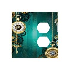 a green and gold light switch plate cover with two clocks on the front, one in the middle