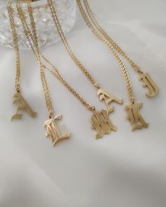 https://khloejewels.com/collections/initial/products/gothic-capital-initial-necklace Bar Necklaces, Curved Bar Necklace, Letter Jewelry, Curved Bar, Bamboo Earrings, Gold Ring Designs, Dope Jewelry, Dainty Gold Necklace, Beautiful Necklace