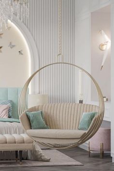 a living room filled with furniture and a chandelier