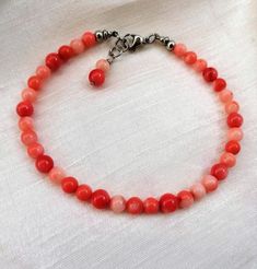 Coral bracelet Pink coral bracelet Natural stone bracelet | Etsy Hand-strung Coral Bracelets With Round Beads, Elegant Adjustable Coral Beaded Bracelet, Adjustable Coral Bracelets With Round Beads, Handmade Coral Bracelet With Round Beads, Hand-strung Coral Beaded Bracelets, Elegant Coral Beaded Bracelets, Elegant Red Coral Beaded Bracelets With Adjustable Fit, Adjustable Coral Bracelets As A Gift, Elegant Handmade Coral Beaded Bracelets