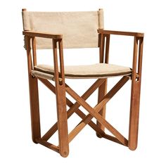 a wooden chair with a beige seat and back cushion on it's armrests