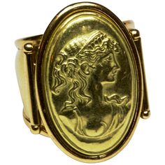 A fabulous example of an embossed portrait ring. beautifully modelled in a rich 18 carat yellow gold. makers mark 'AR' Head: 25.89mm x 19.31mm Band Width: 13.42mm Ring Size: L1/2 or 6