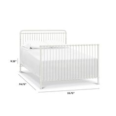 a white crib is shown with measurements for the bed and side rails on it