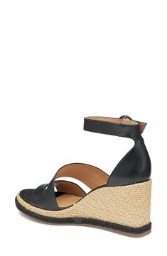 A woven wedge heel makes a bold addition to an ankle-strap sandal complete with comfort-enhancing OrthoLite cushioning. Adjustable ankle strap with buckle closure; hidden elastic inset OrthoLite® footbed Leather upper and lining/rubber sole Made in Brazil Leather Heels With Woven Sole And Ankle Strap, Chic Adjustable Ankle Strap Wedge Sandals, Casual Woven Leather Ankle Strap Heels, Casual Woven Leather Heels With Ankle Strap, Casual Ankle Strap Heels With Woven Leather, Leather Wedge Sandals With Woven Detail, Chic Adjustable Wedge Sandals With Heel Loop, Modern Ankle Strap Wedge Sandals For Beach, Leather Wedge Sandals With Block Heel For Vacation